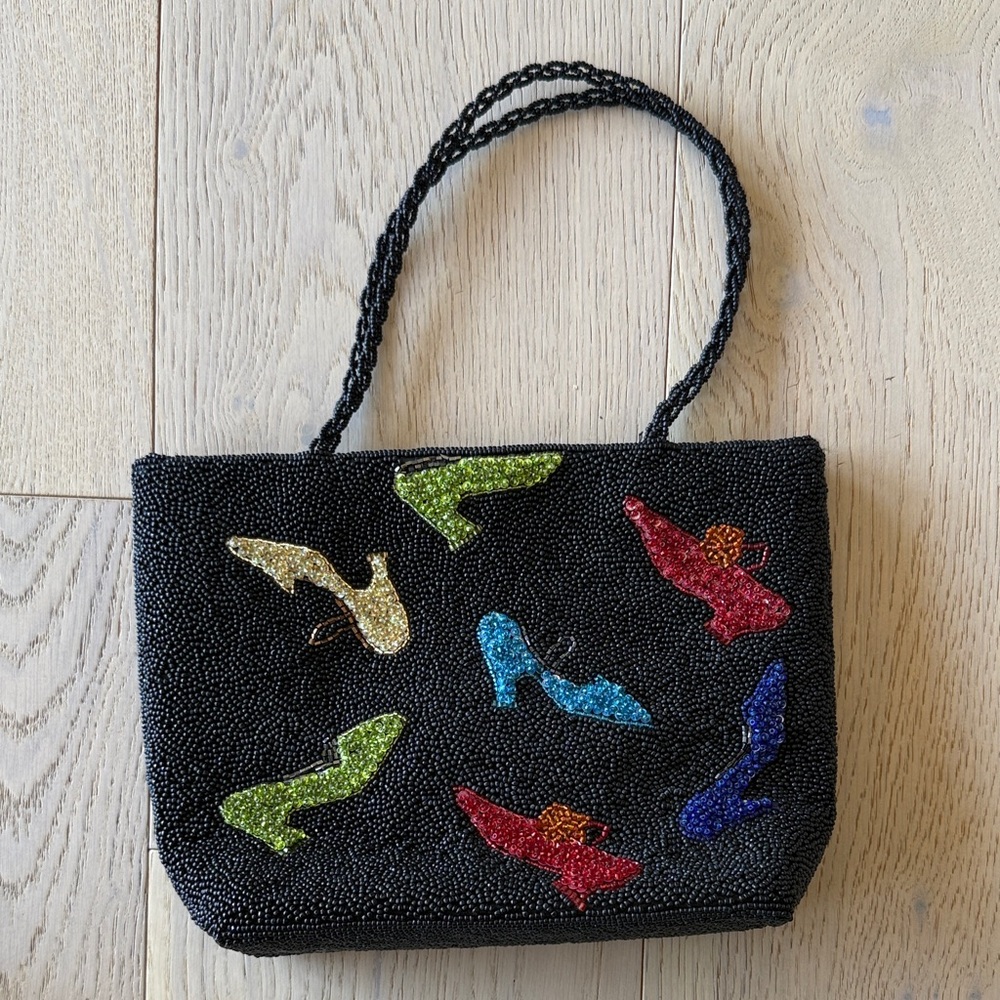 Chic Black Beaded Bag with Vibrant Shoe Accents